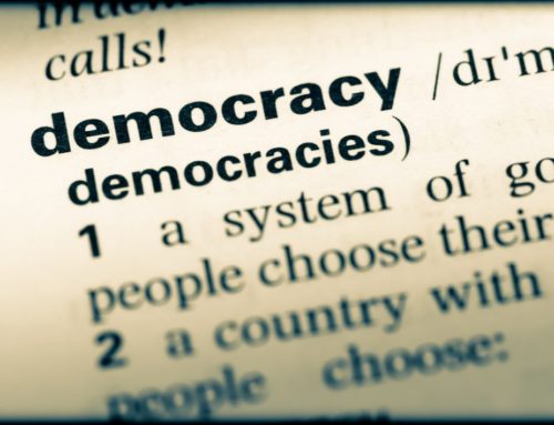 Is Democracy Sounding Its Death Rattle?